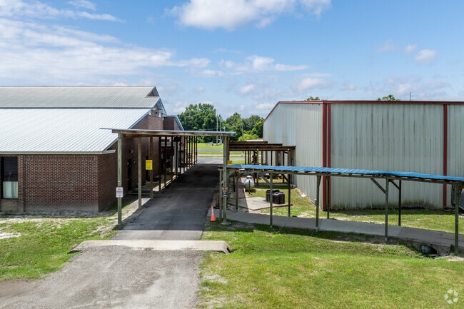 Students walk the shaded sidewalks between classes at Hope Christian Academy.