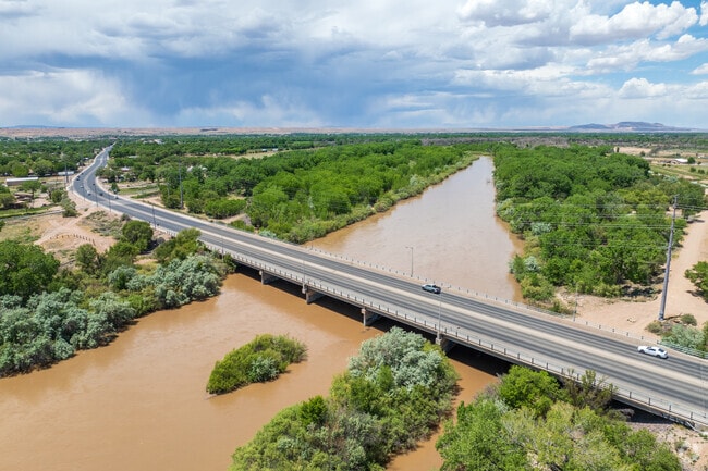 The bridge over the Rio Grande River connects Adelino to nearby town of Belen.