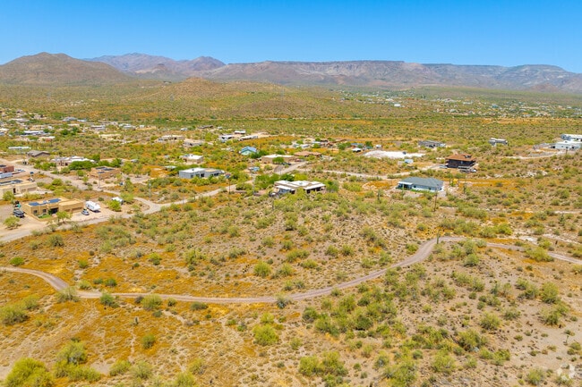 From above, witness the seamless blend of New River's homes and the desert wilderness.