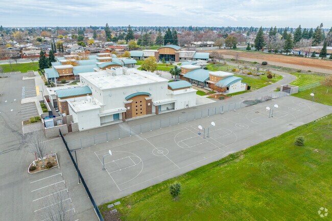 Play basketball at George Washington Carver School Of Arts And Science