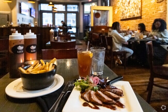 Shaved Duck Smokehouse has smoked meats, & fries, is located just outside of Compton Heights.