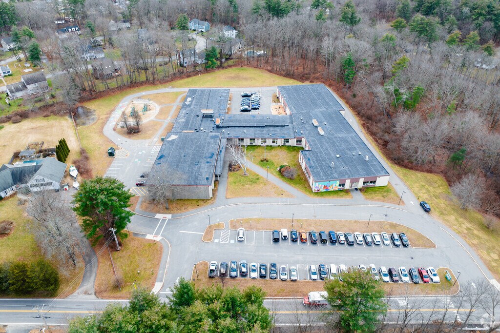 There is a playground in the rear of Dr. Frederick N. Sweetsir Elementary School.