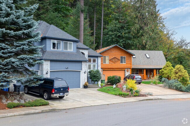 Homes with large lots back up into a park on Loundree Dr in Sandy.
