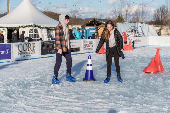 A pop-up, outdoor skating rink in Newtown Square is a fun attraction for young and old.