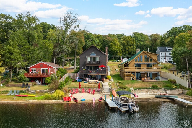 Rows of homes line up by Nipmuc Pond.