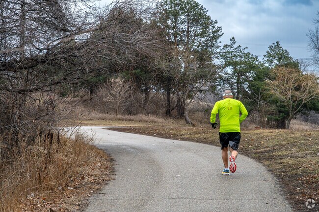 Joggers enjoy the extensive trails at Boom Island Park.