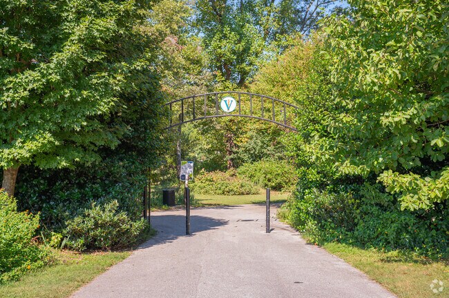 The main gate welcomes you to the park along the walkway in Vines Park.