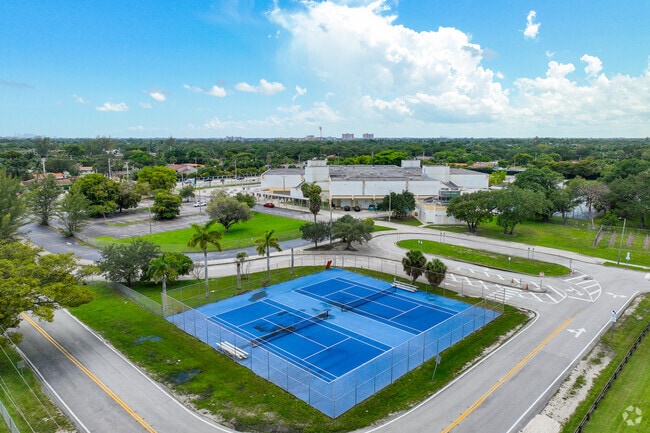 There are tennis courts in the back of Highland Oaks Middle School.