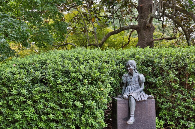 Swan Lake is surrounded by many statues and green spaces for Lakewood residents to enjoy.