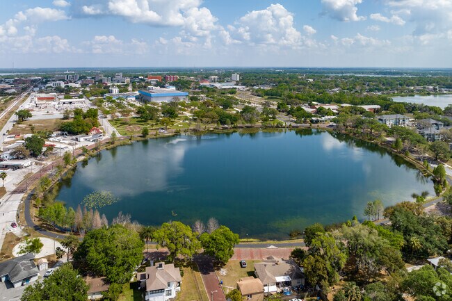 Residents take walks on the paved path around Lake Beulah.