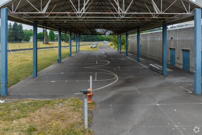 Students play basketball at Walt Morey Middle on SW Lucas Ave in Troutdale.