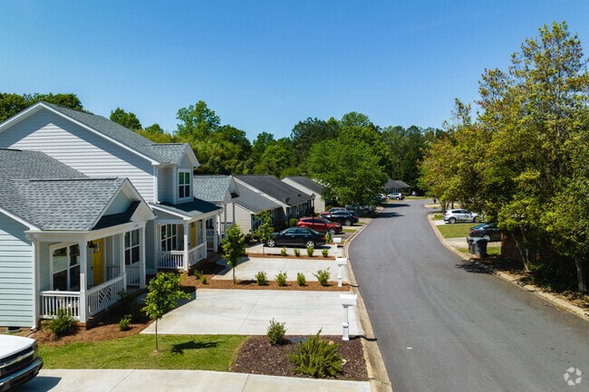 A line of craftsman style homes with small front yards can be found throughout Fernwood.