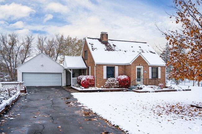 Clarence neighborhoods have beautiful brick homes with attached garages.