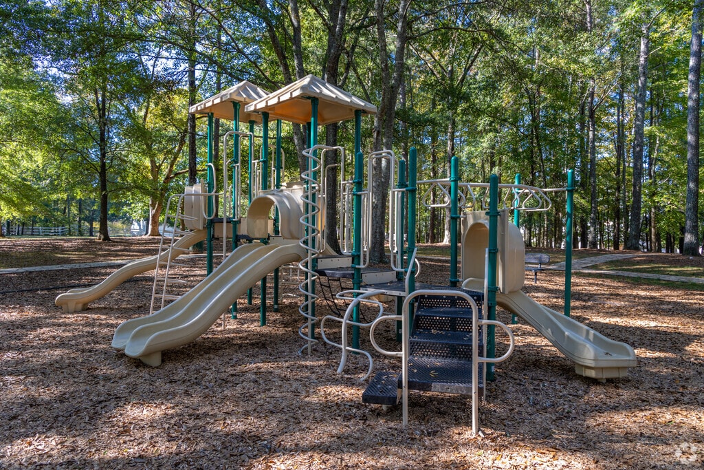 Oak Park Square's playground has three slides and climbing structures.