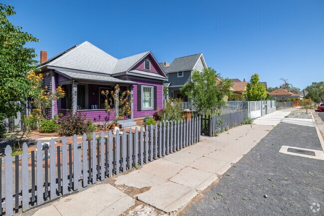 A pop of purple gives this Huning Highlands Victorian charm in Broadway Central Corridor.