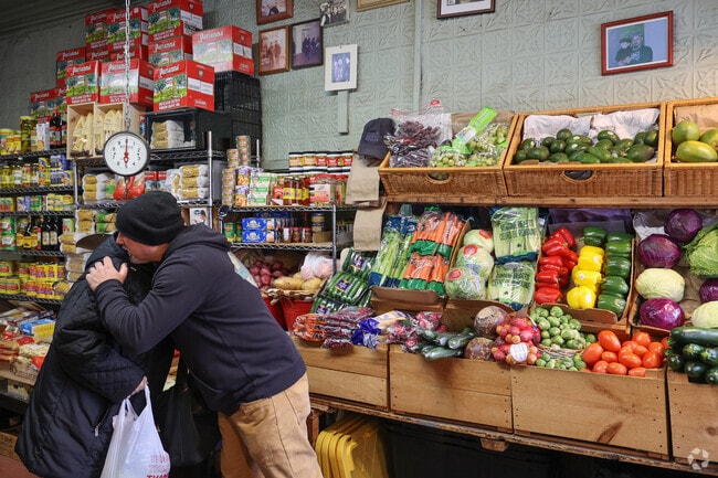 Al greets all his locals with love at Alba Produce in the North End.