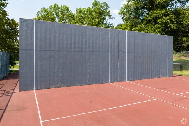 Practice your tennis or play some handball at Children's Town Park.