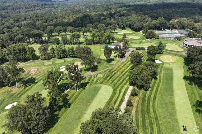 Golfers perfect their swing at Rolling Hills Country Club in Cannondale.