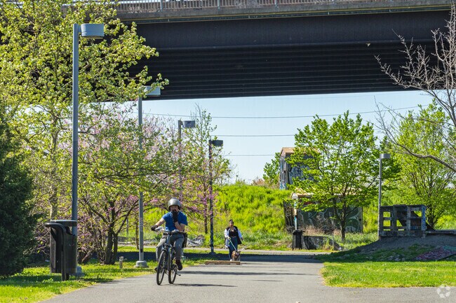Go for a bike ride or walk the dog in the scenic Grays Ferry Crescent Trail Park.