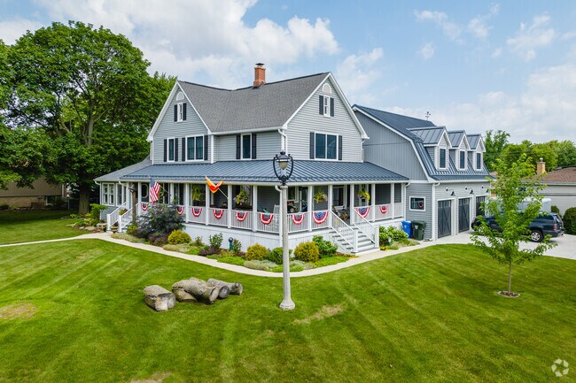 Some homes in Colonial Heights have large yards with a wrap around porch.