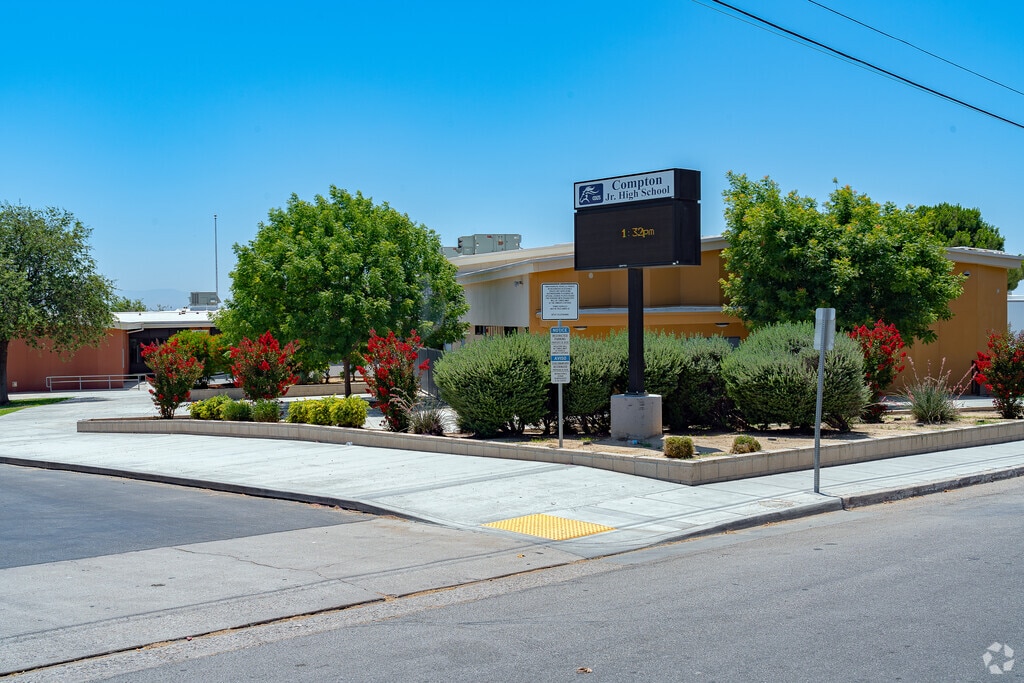 The sign at Compton Jr High School welcomes students and staff as they enter the campus.