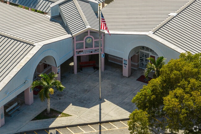 Amidst Riverside's Charm, Learning Flourishes, Illuminating Young Pathways.