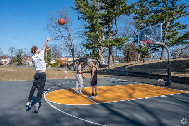 Kids from New Rochelle enjoy the basketball courts at Stephenson Park.