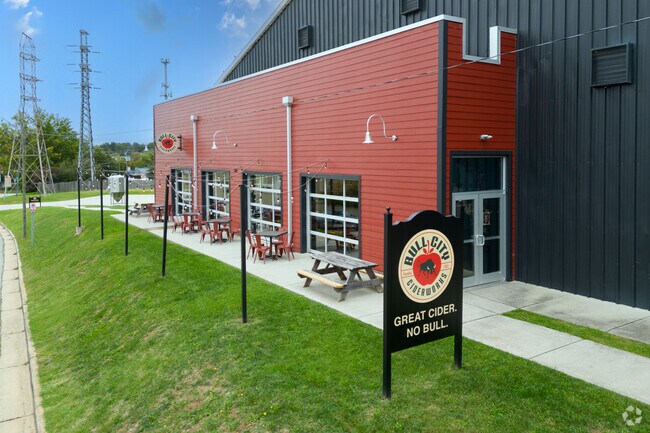 You can sit outside under decorative lights at Bull City Ciderworks in White Oak