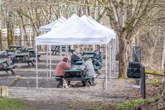 Enjoy the outdoor dining at SugarPine, which sits just next to the Sandy River.