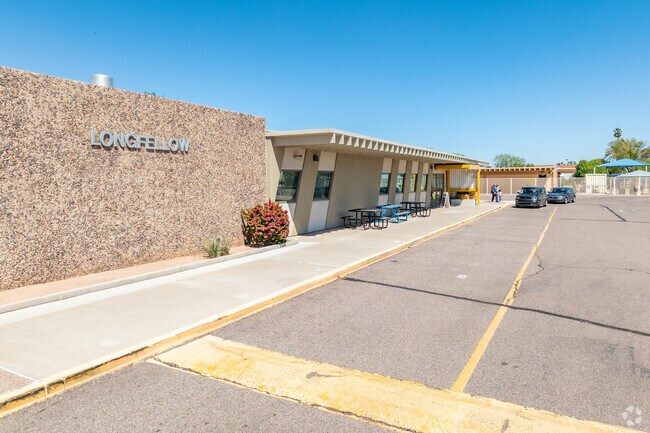 Longfellow Elementary School nurtures young minds with care and excellence in Reed Park.