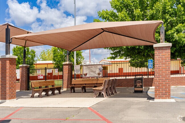 A covered bench area has been erected in front of Richgrove Elementary School for students.