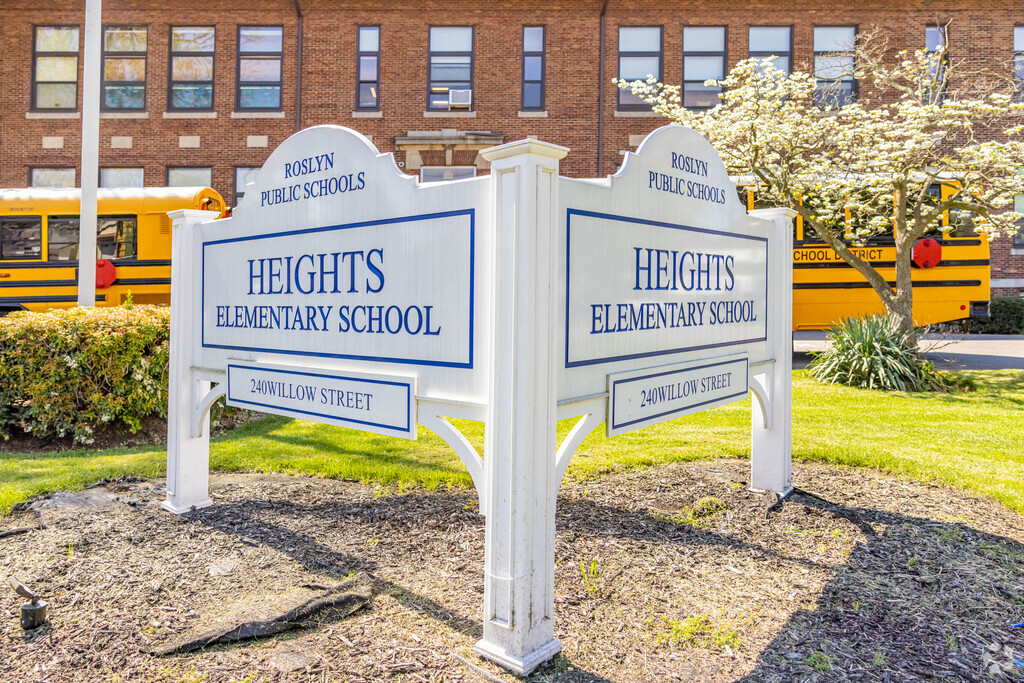 The Front of Heights Elementary School in Welcome to Donald Street Park in Roslyn Heights.