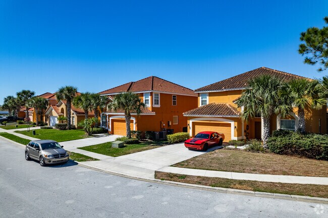 Beautiful, orange tone homes with attached garages in Loughman.