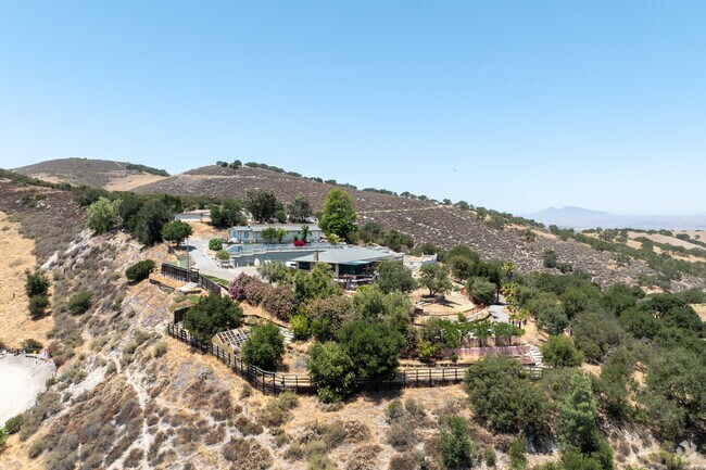 This hillside ranch estate in Pine Canyon offers privacy and breathtaking valley views.