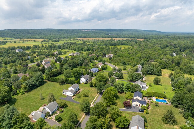 Montgomery homes often feature long driveways and generous setbacks.