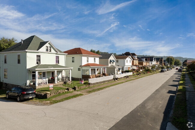 Smaller lots with white fences are prevalent in Newell.