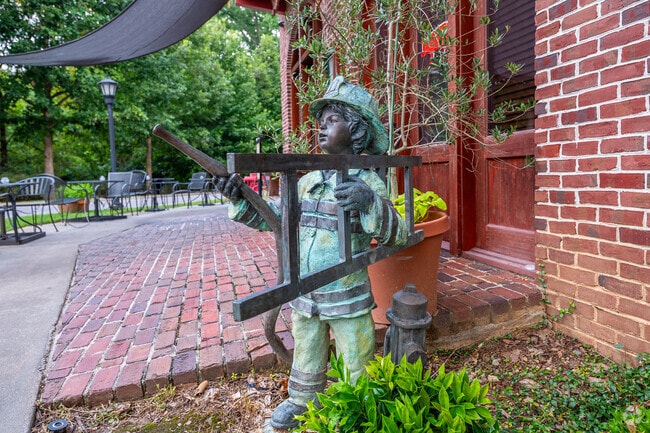 A local art statue sits in front of The Larder restaurant in Hammond's Ferry.