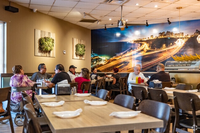 Families travel to La Perla Peruvian Restaurant for delicious Peruvian meals.