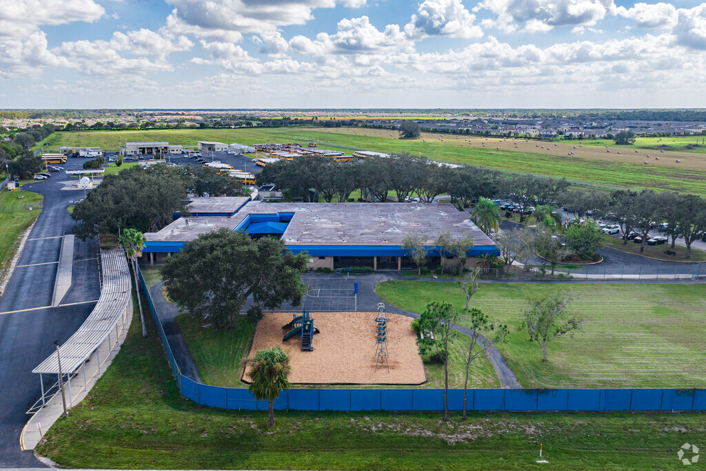 Buckingham Exceptional Student Center has a playground and basketball court beside the school.