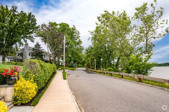 Beautiful homes can be found along the roadway facing the bay in Douglas Manor.