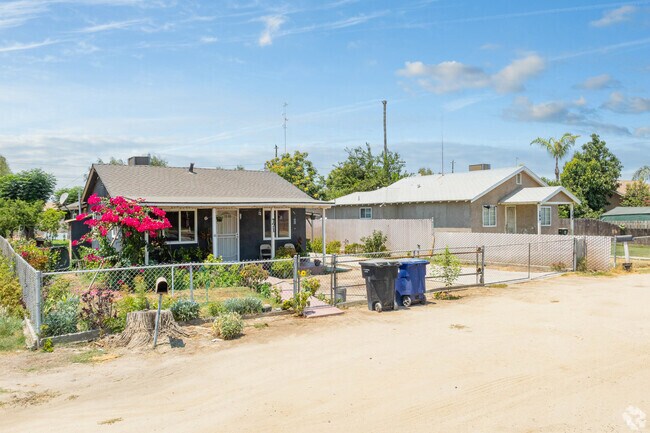 Some Tipton homes feature colorful front yard gardens with seasonal flowers.