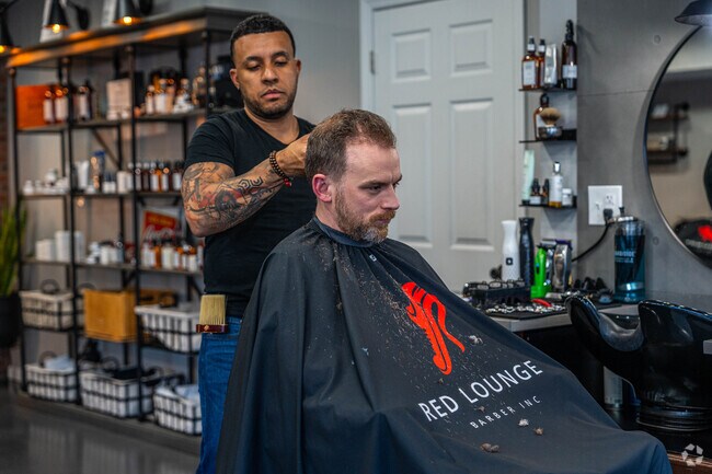 Get a fresh haircut at Red Lounge in Wharton.