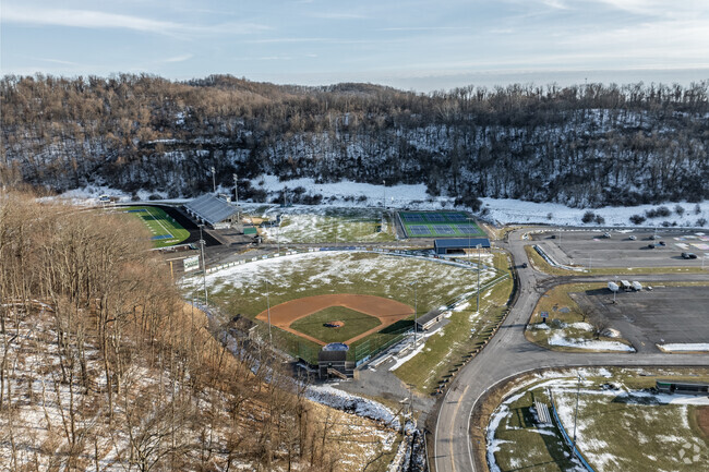 The sports fields sit together off to the side of Robert C. Byrd High School.