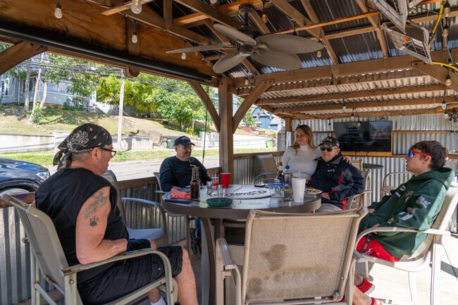 Friends gather for lunch on the patio at Bg's Main Even Bar and Grill in Rittman, Ohio.