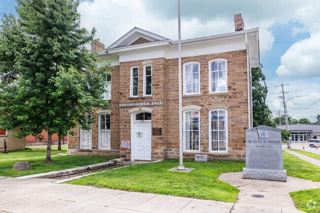 The original Bushwhacker Jail remains as a historical landmark in downtown Nevada.