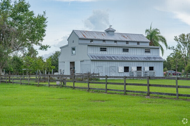 Large barns in Myakka Valley Ranches house horses and gear.