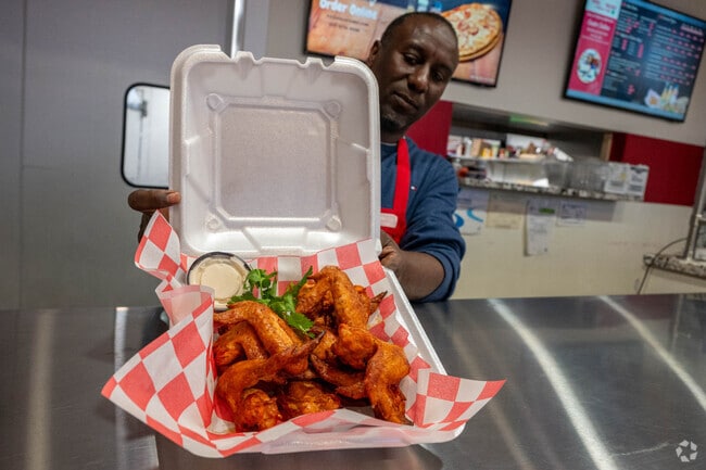 Aside from Pizza, Pizza Palace also offers delicious wings, a favorite of locals.