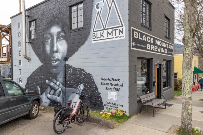 Black Mountain has many murals including the memorial to Roberta Flack on the brewery wall.