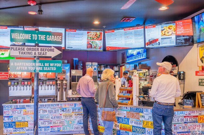 The Garage Burgers & Beer near Kickingbird is a popular American-style restaurant.