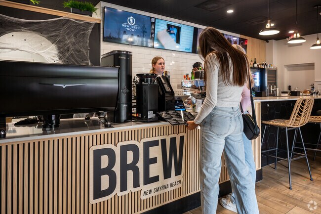 Venetian Bay is home to BREW, a coffee house that also serves beer and wine.
